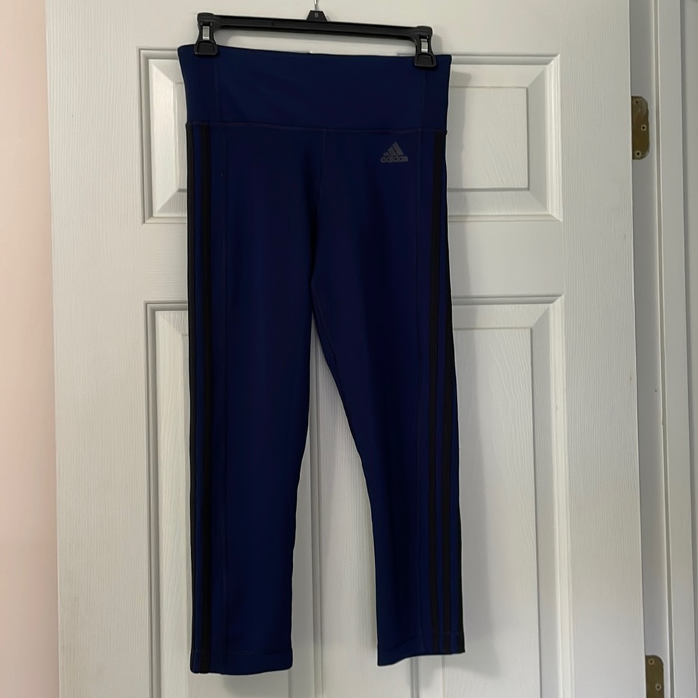 Like new navy blue with black stripes Adidas size small workout pants.
